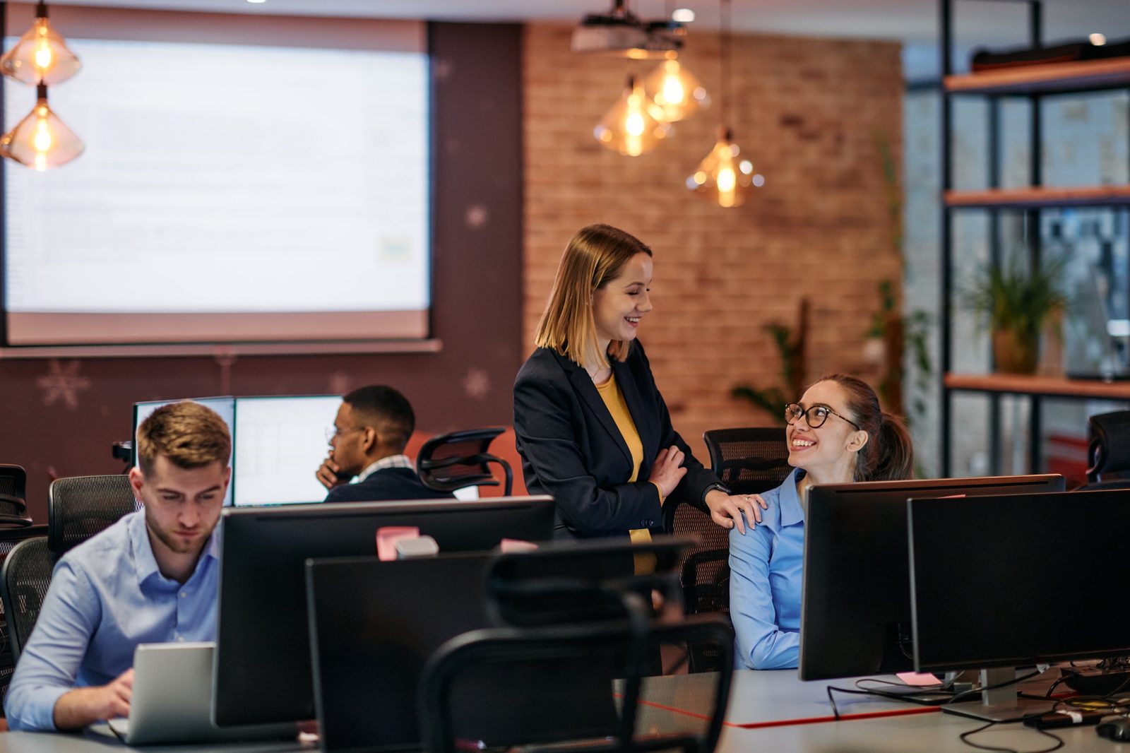 An ABA ONE customer team collaborating in a modern office